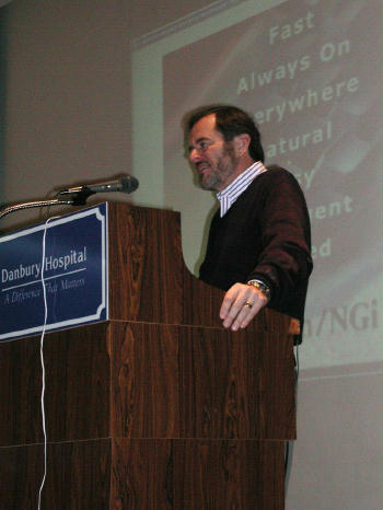 John Patrick at podium