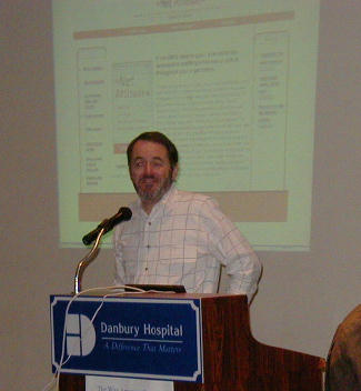 John Patrick at podium