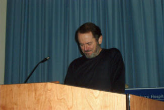 John Patrick at podium